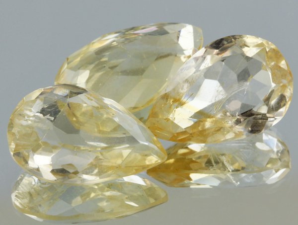 25.5ct Lemon Yellow Citrine Pear Cut Parcel: Excellent heated grade 9 of 10 specimen; estimated Gem Guide wholesale $35, estimated retail $100; Africa origin