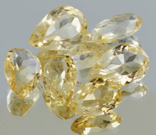 23.4ct Lemon Yellow Citrine Pear Cut Parcel: Excellent heated grade 9 of 10 specimen; estimated Gem Guide wholesale $35, estimated retail $100; Africa origin