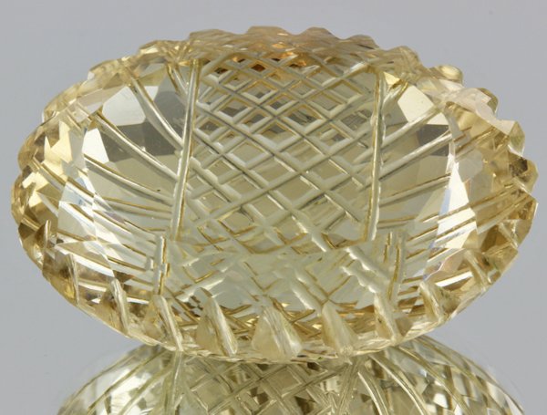 95.8ct Lemon Yellow Citrine Carved Cut: Excellent heated grade 9 of 10 specimen; estimated Gem Guide wholesale $35, estimated retail $100; Brazil origin