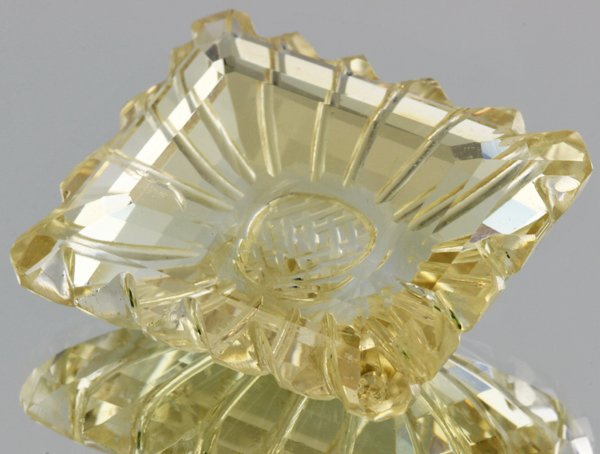 49.1ct Lemon Yellow Citrine Carved Cut: Excellent heated grade 9 of 10 specimen; estimated Gem Guide wholesale $35, estimated retail $100; Brazil origin