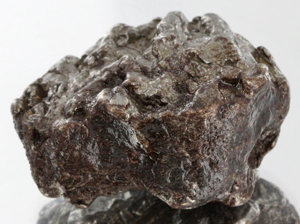 51gm Meteorite Campo Del Cielo Argentina: Scarce remnant of prehistoric (2000-4000bc) meteorite discovered in the 16th century; a main mass of 18 tons has been discovered along with a shower of smaller breakup fragments; cosmic age is young f