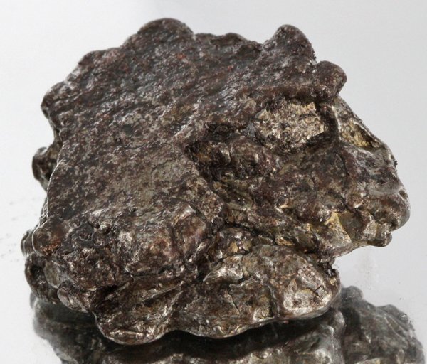 43gm Meteorite Campo Del Cielo Argentina: Scarce remnant of prehistoric (2000-4000bc) meteorite discovered in the 16th century; a main mass of 18 tons has been discovered along with a shower of smaller breakup fragments; cosmic age is young f