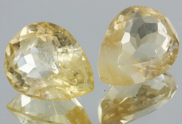 21.5ct Lemon Yellow Citrine Pear Cut Pair: Excellent heated grade 9 of 10 specimen; estimated Gem Guide wholesale $35, estimated retail $100; Africa origin