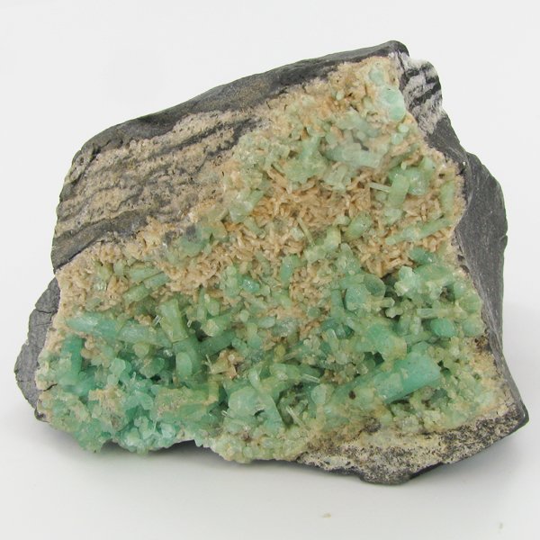 1700ct Natural Colombian Emerald Crystal Cluster: Excellent specimen with pyrite crystals and small emerald crystal vein on base material
