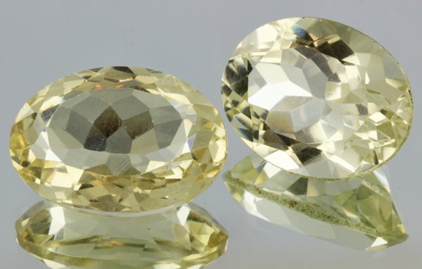 31.6ct Lemon Yellow Citrine Oval Cut Pair: Excellent heated grade 9 of 10 specimen; estimated Gem Guide wholesale $35, estimated retail $100; Africa origin