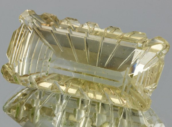 38.1ct Lemon Yellow Citrine Carved Cut: Excellent heated grade 9 of 10 specimen; estimated Gem Guide wholesale $35, estimated retail $100; Brazil origin
