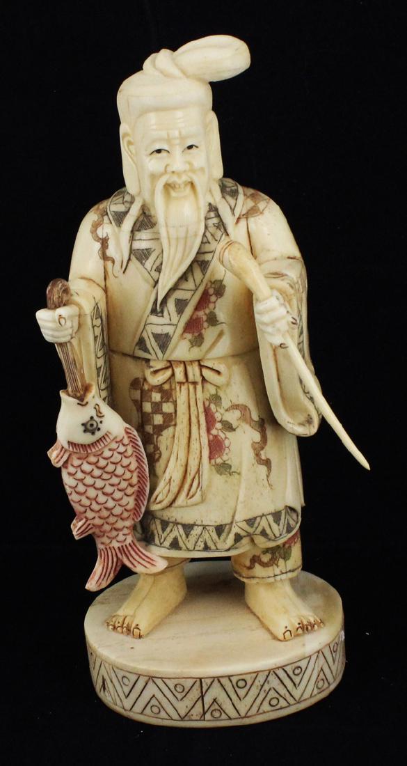 Handcarved Chinese Bone Fisherman: Excellent handcarved piece; 8"