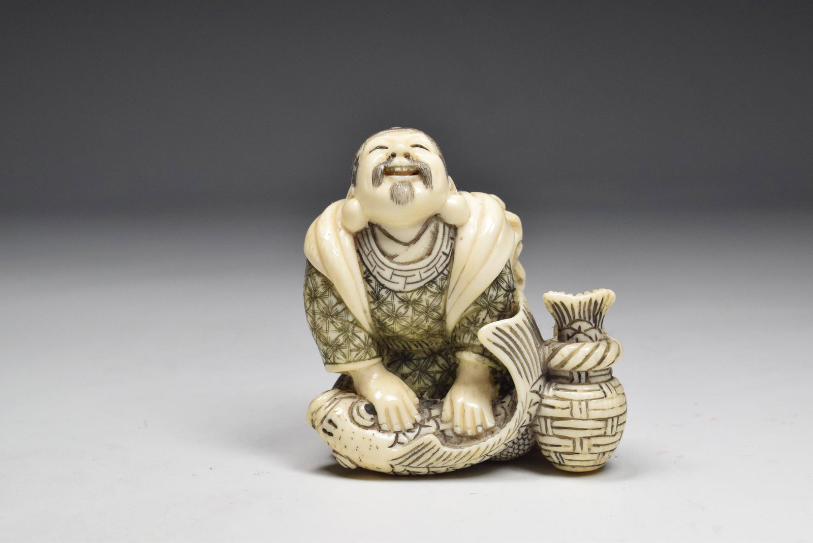 Japanese Fish Man Bone Signed Netsuke: Japanese Fish Man Bone Signed Netsuke (2 x 1.7 x 1 inches)