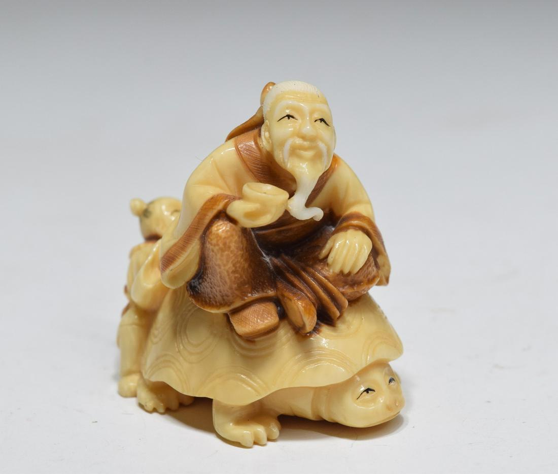 Japanese Bone Old Man with Child & Turtle Netsuke: Japanese Bone Old Man with Child & Turtle Netsuke (1.6 x 1.3 x 1.4 inches)