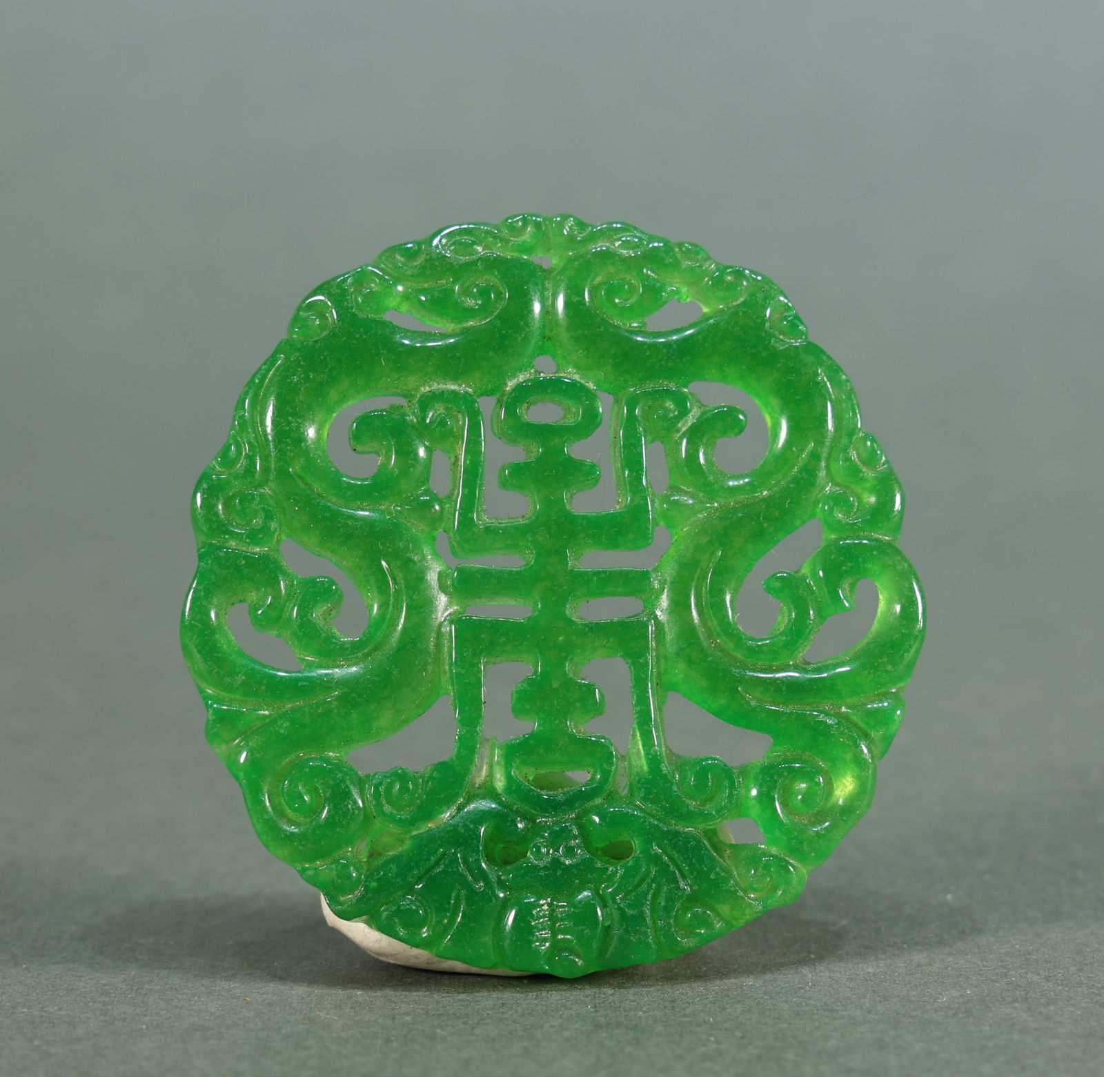 Jadeite Dragon Pendant: Jadeite Dragon Pendant Karl's Collections Inc provides condition reports as a courtesy to our clients and assumes no liability for any error or omission. Any condition statement is given as a courtesy