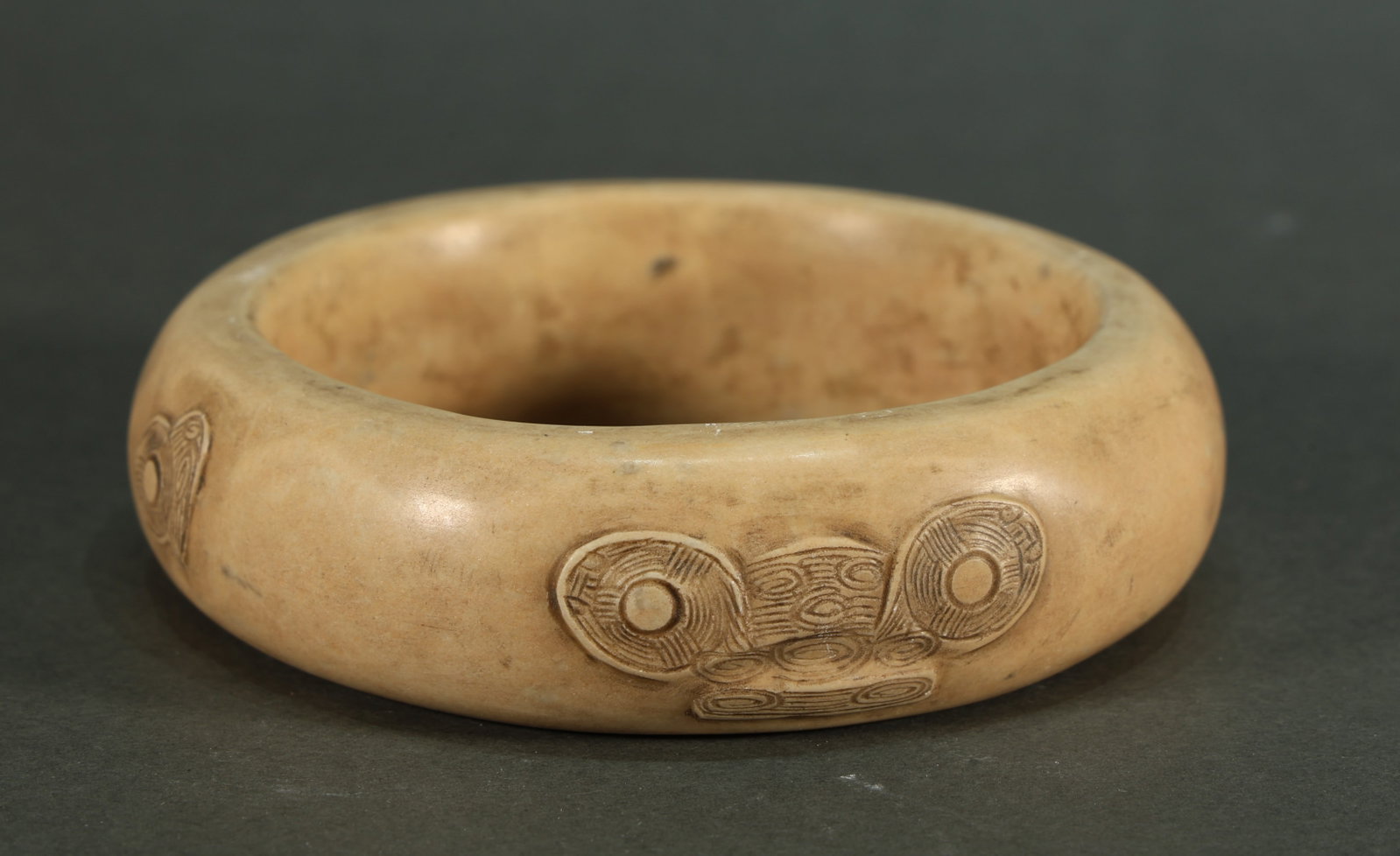 Chicken Bone White Jade Bangle: Chicken Bone White Jade Bangle Karl's Collections Inc provides condition reports as a courtesy to our clients and assumes no liability for any error or omission. Any condition statement is given as a 