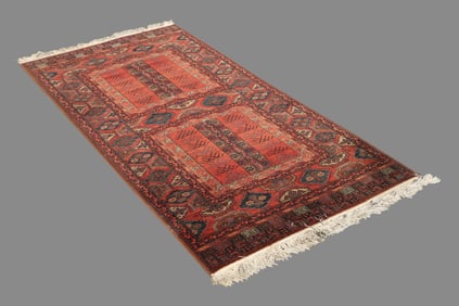 An Red Rug With Square Pattern Center