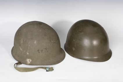 2 Of War Era Steel Helmets