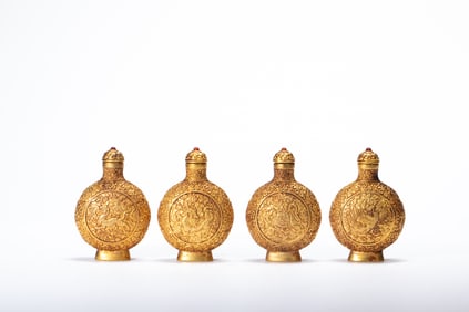 Group of Four Gilt Bronze Carved Flower and Beast Pattern Snuff Bottle