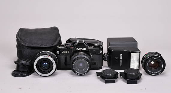 Canon AE-1 FD 28mm Film Camera With 3 Lense: Canon AE-1 FD 28mm Film Camera With 3 Lense (About 17 x 14 x 10 cm more or less) Vivitar FD 28mm f2.8, Vivitar Marco 50mm f2.5, Canon 50mm f1.8 Lenses