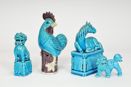 Four Chinese Blue And Purple Glazed Ceramic Figurines