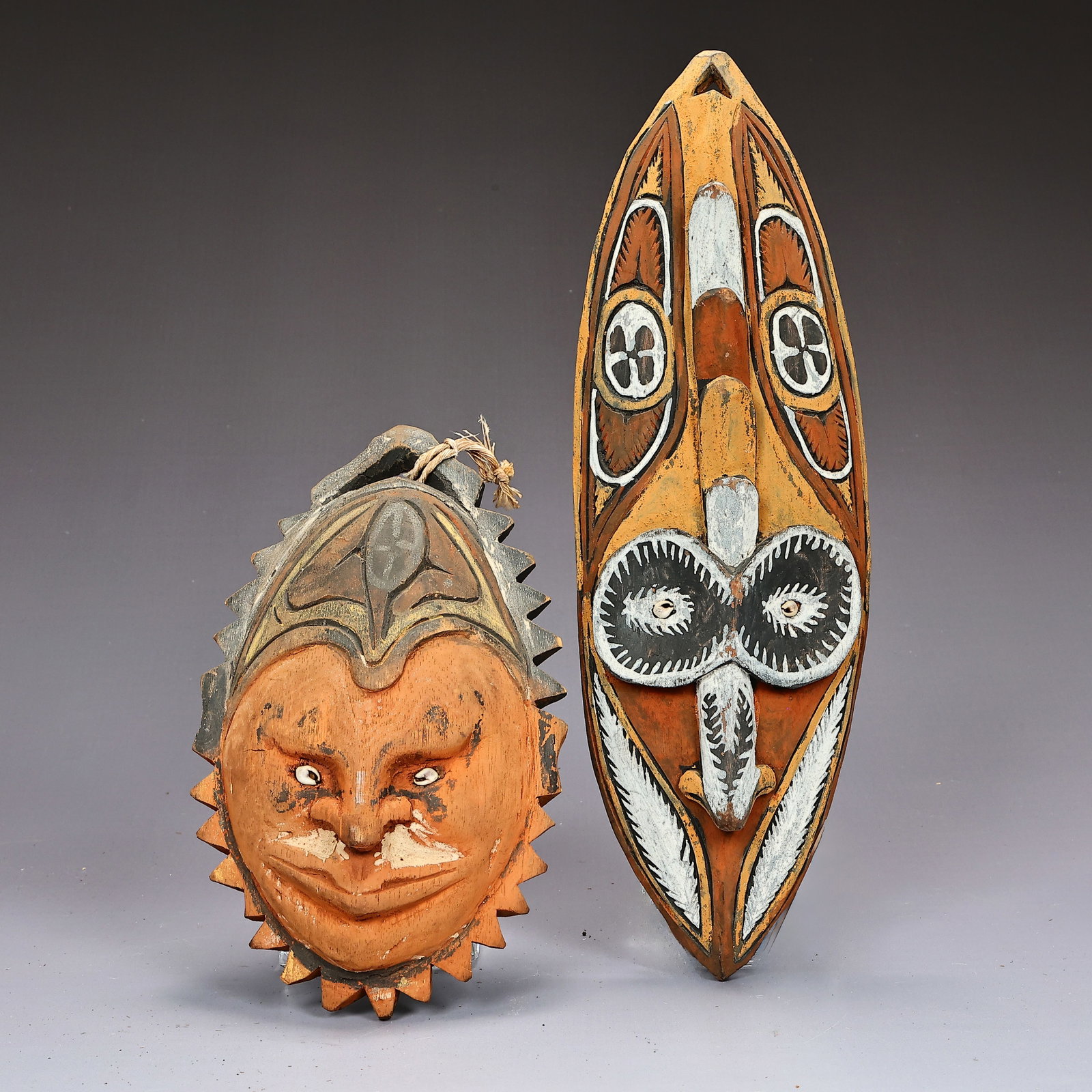 Two Hand Painted Wood Spirit Masks: Two Hand Painted Wood Spirit Masks (33 x 12 x 4 cm, 22 x 14 x 4 cm)