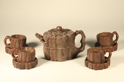 Group of Nine Purple Clay Carved Tree Pattern Teapot