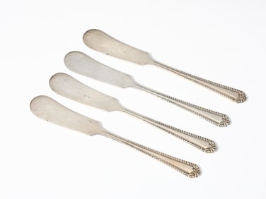 Four Sterling Silver Butter Knives By National Silver