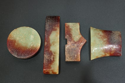 Group of Four Jade Carved Cloud Pattern Sword Ornament