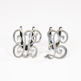 Pair Of Monogrammed Apollo Silver Plate Napkin Clips
