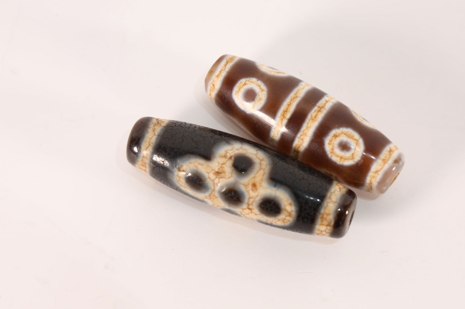 Pair of Dzi Bead: Pair of Dzi Bead (4.5 x 1.2cm)