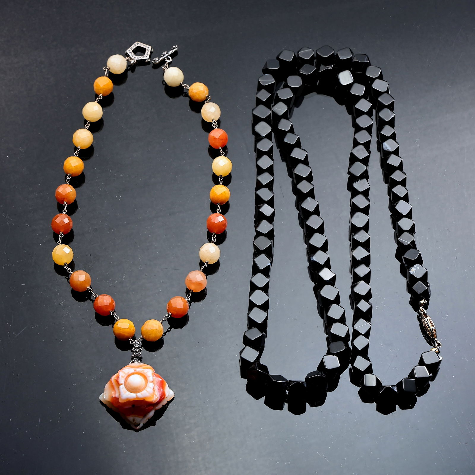 Faceted Carnelian Beaded Necklace And Black Cube Onyx Necklace: Faceted Carnelian Beaded Necklace And Black Cube Onyx Necklace (41.5 x 1 cm, 25 x 1 cm)