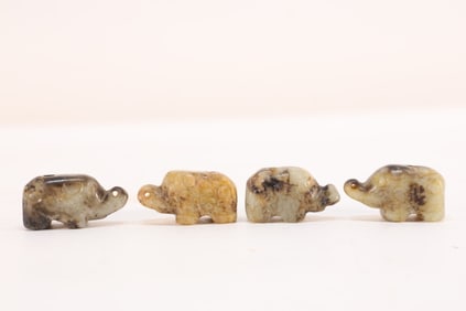 Group of Four Jade Carved Elephant Shape Ornament