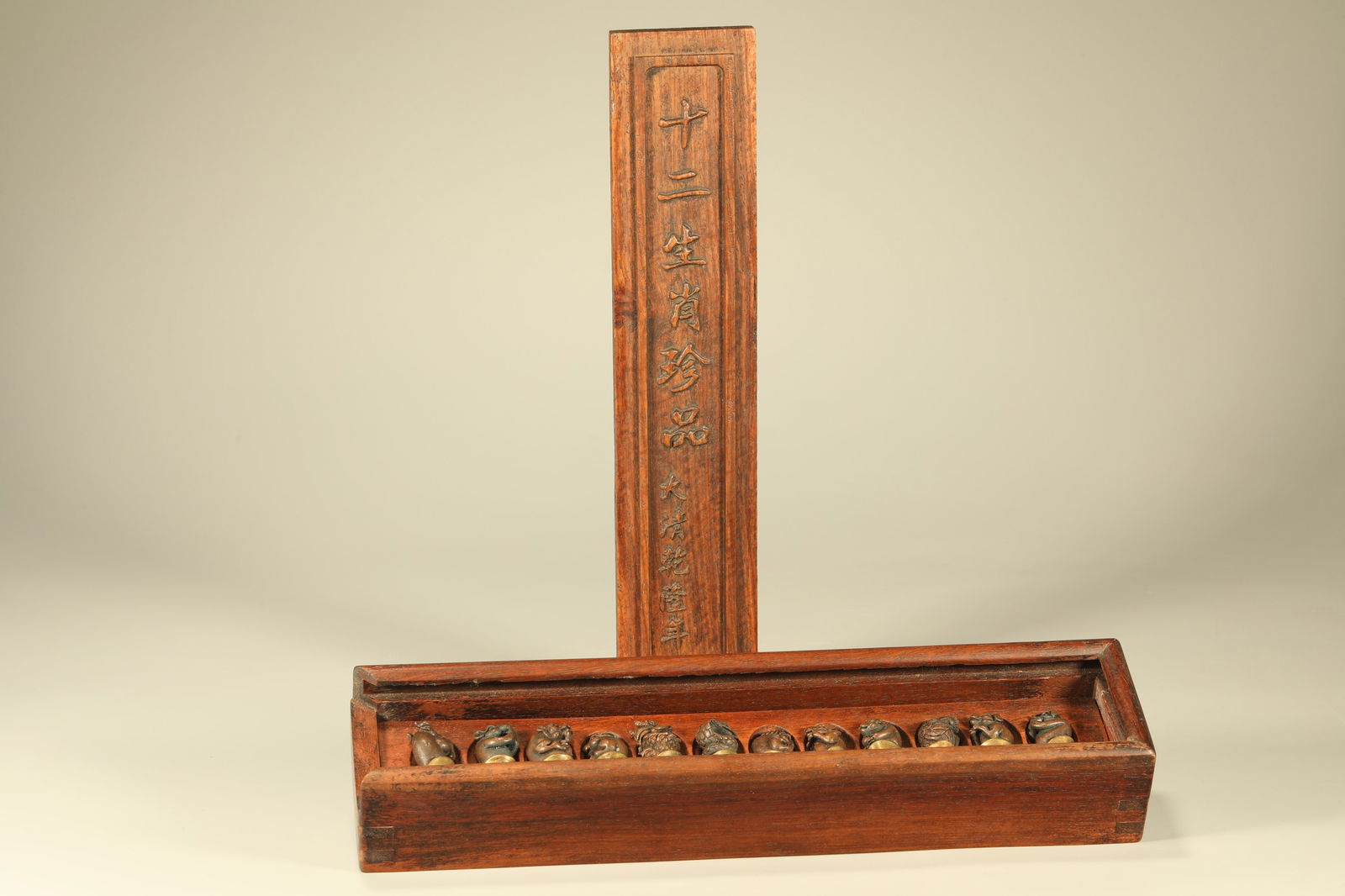 Group of Twelve Bronze Carved Chinese Zodiac Shape Ornament: Group of Twelve Bronze Carved Chinese Zodiac Shape Ornament (30 x 7 x 4.8cm)