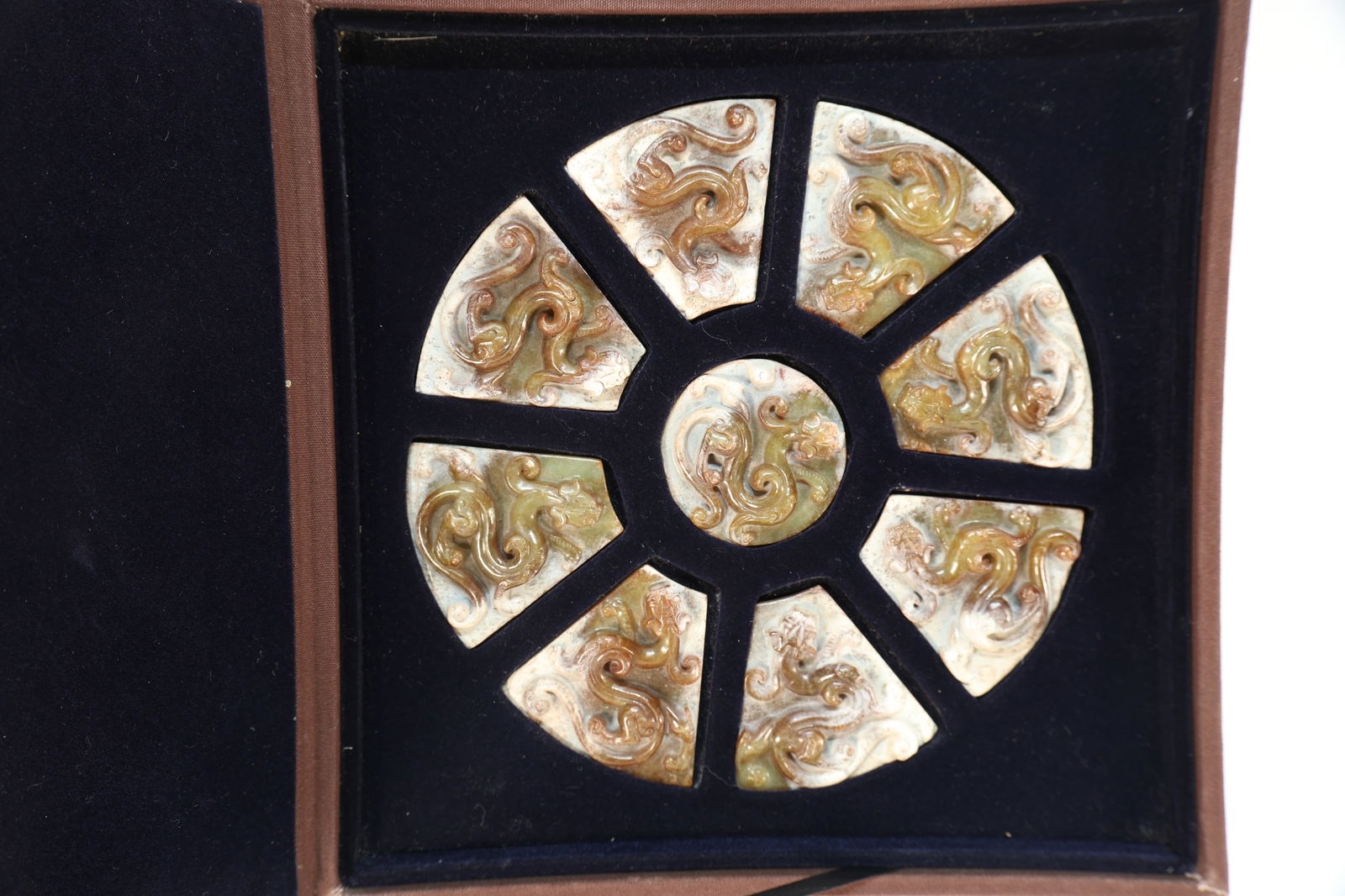 Group of Nine Jade Carved Chi Dragon Bi: Group of Nine Jade Carved Chi Dragon Bi (20 x 5.7 x 6.5 x 1.3cm)