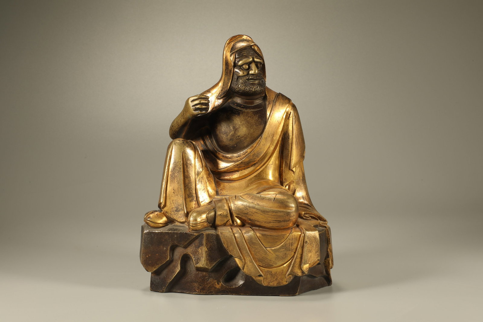 Gilt Bronze Arhat Figure: Gilt Bronze Arhat Figure (21.8 x 15.5 x 7cm)