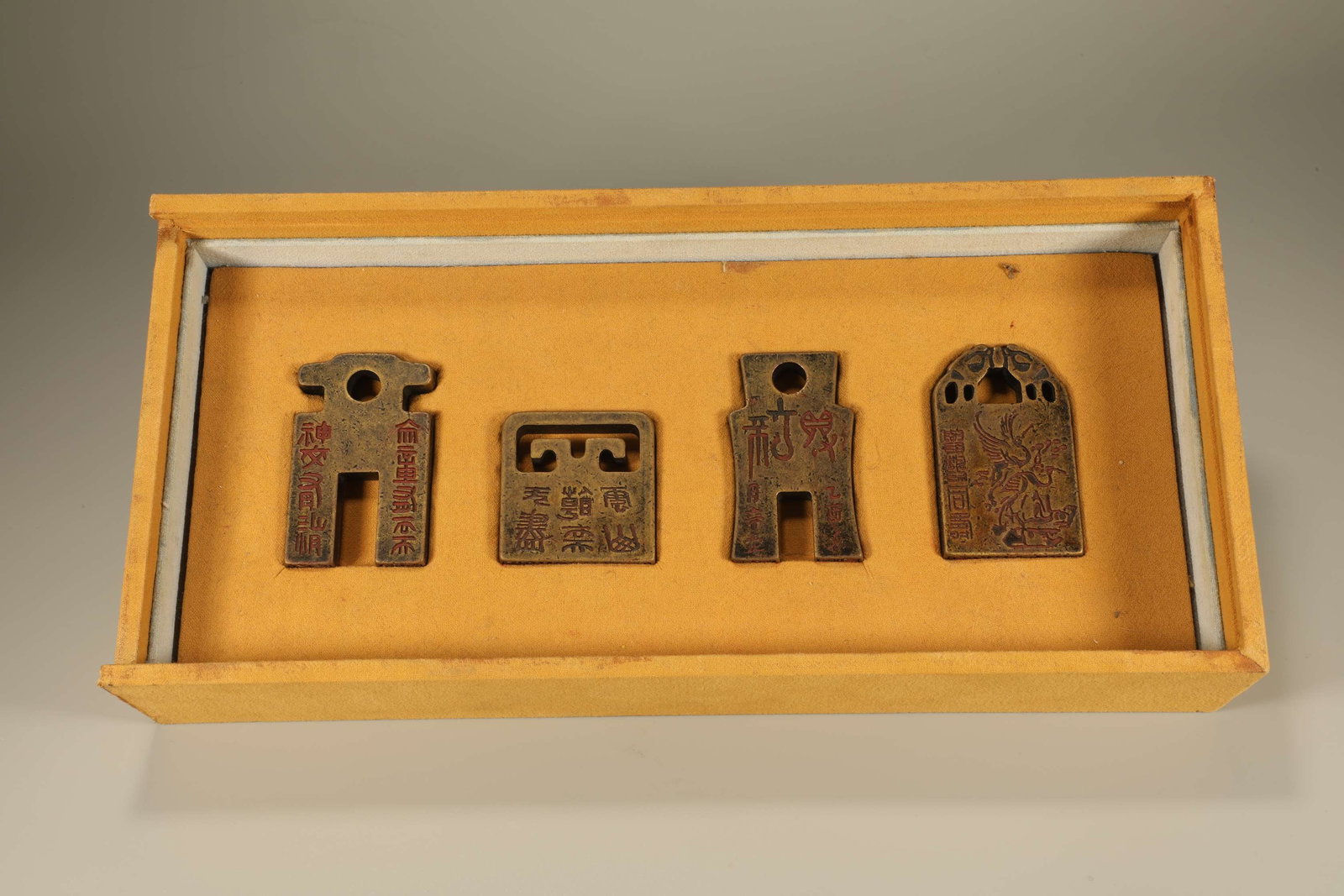 Group of Four Bronze Carved Poetry Pattern Stone Seal: Group of Four Bronze Carved Poetry Pattern Stone Seal (7.5 x 4.5 x 1cm)