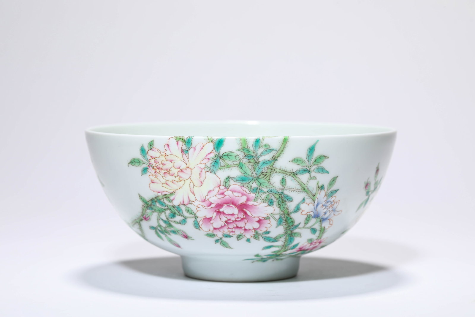 A FAMILLE-ROSE ‘BUTTERFLIES AND PEONY’ BOWL (1 of 4)