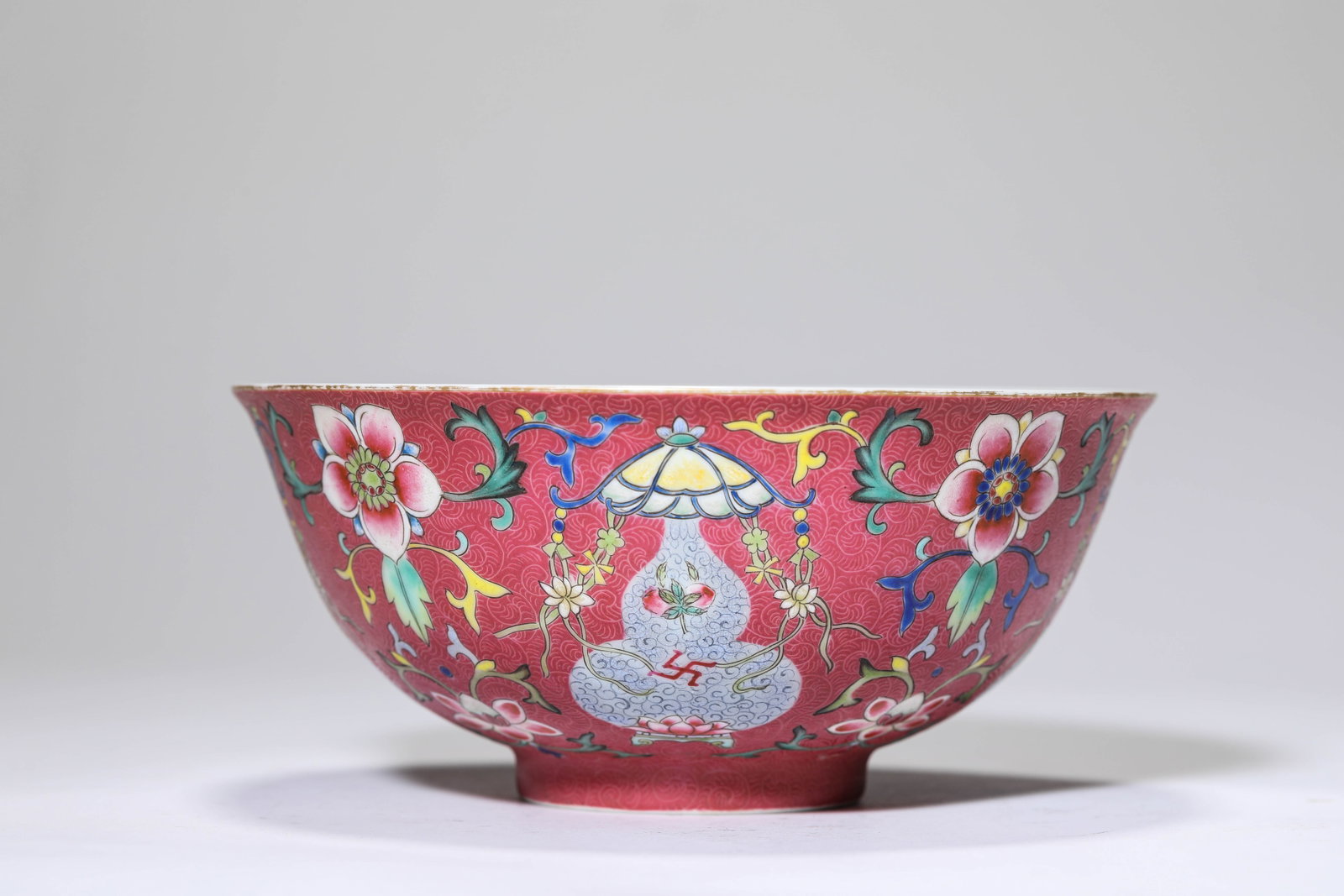 A ROUGE-GROUND FAMILLE-ROSE ‘FLORAL’ BOWL (1 of 4)
