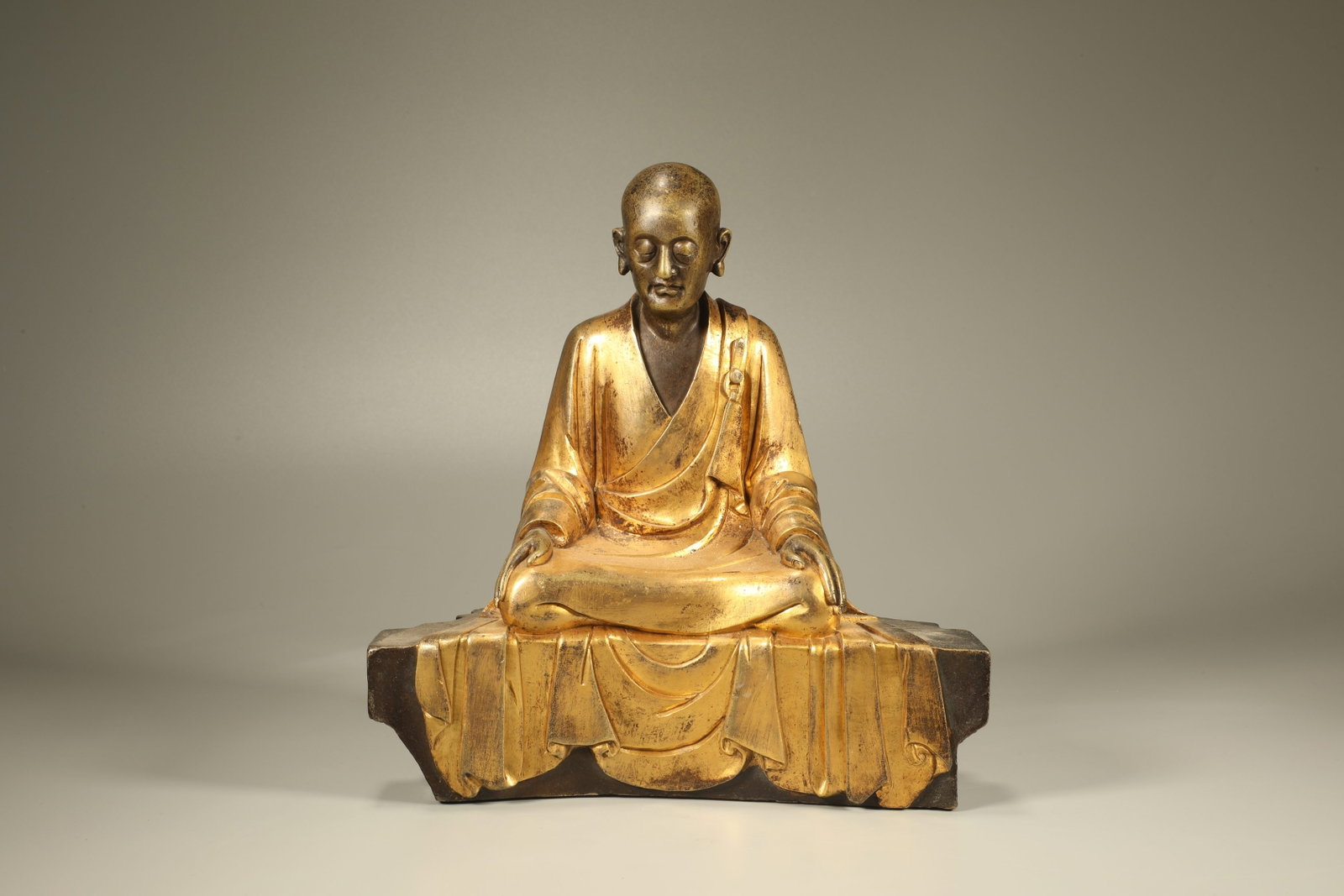 Gilt Bronze Arhat Figure: Gilt Bronze Arhat Figure (22.5 x 21 x 8.5cm)