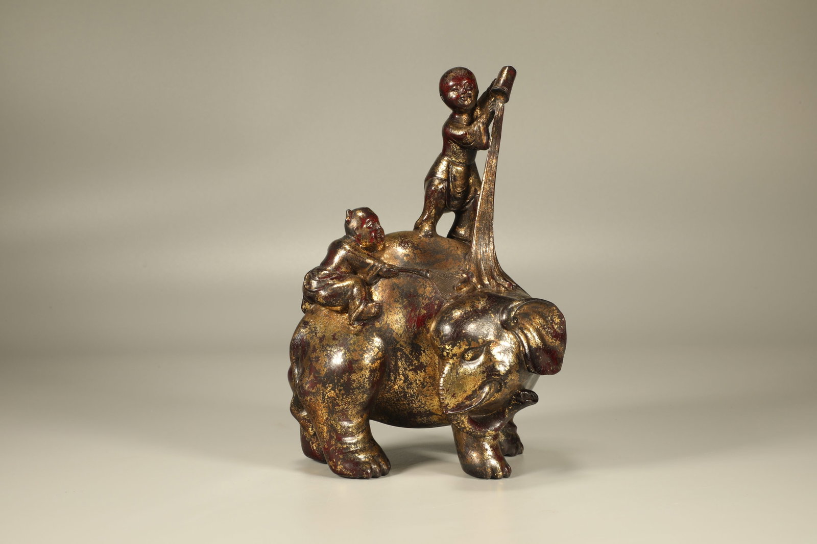 Red Sandalwood Gold Drawing Carved Elephant and Children Shape Figure: Red Sandalwood Gold Drawing Carved Elephant and Children Shape Figure (13 x 10 x 21cm)