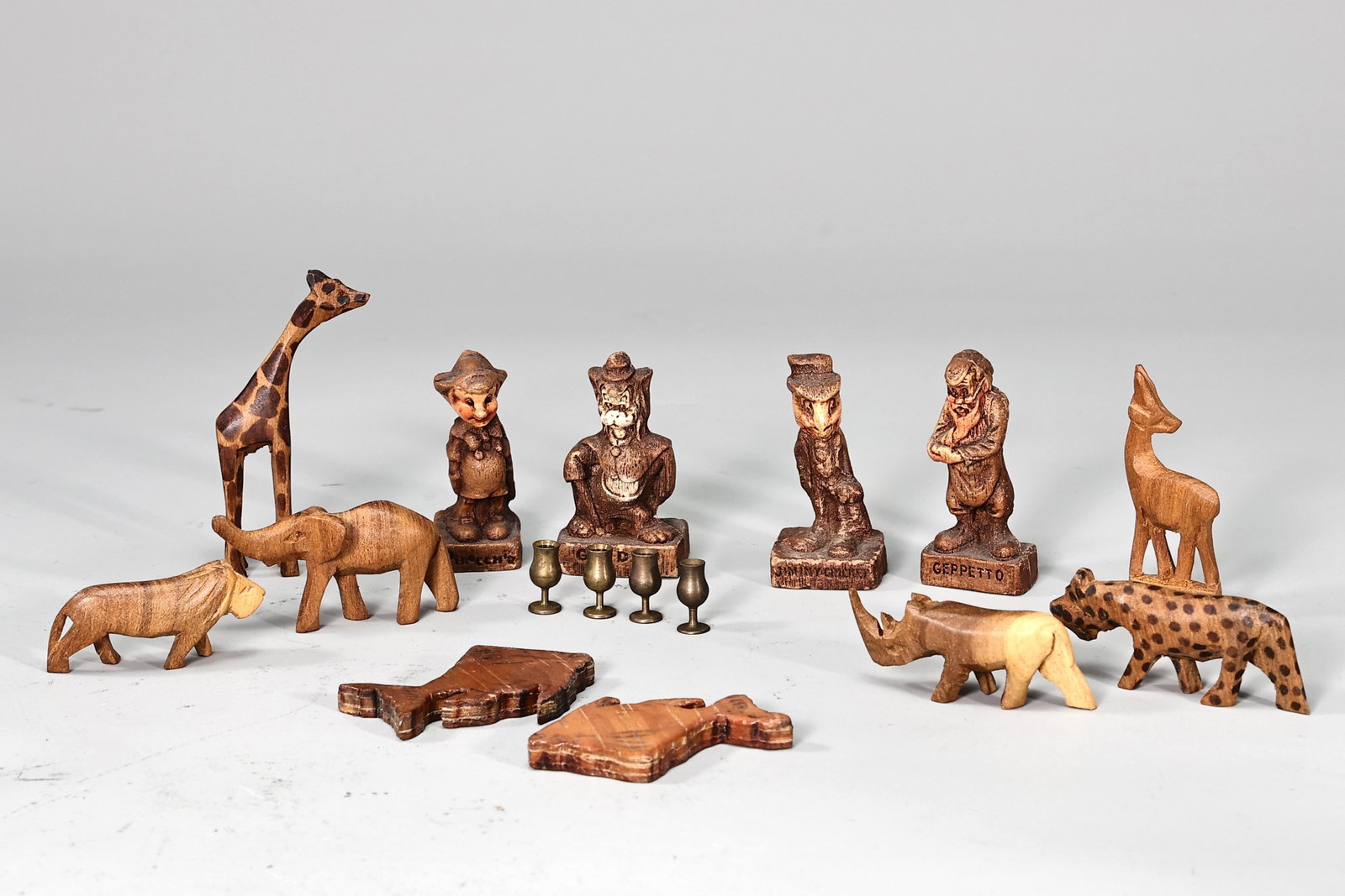 Hand Carved Wooden Animal Figurines And Disney 1940s Sirocco Character: Hand Carved Wooden Animal Figurines And Disney 1940s Sirocco Character (About 2.5 x 2.5 x 5 cm more or less)