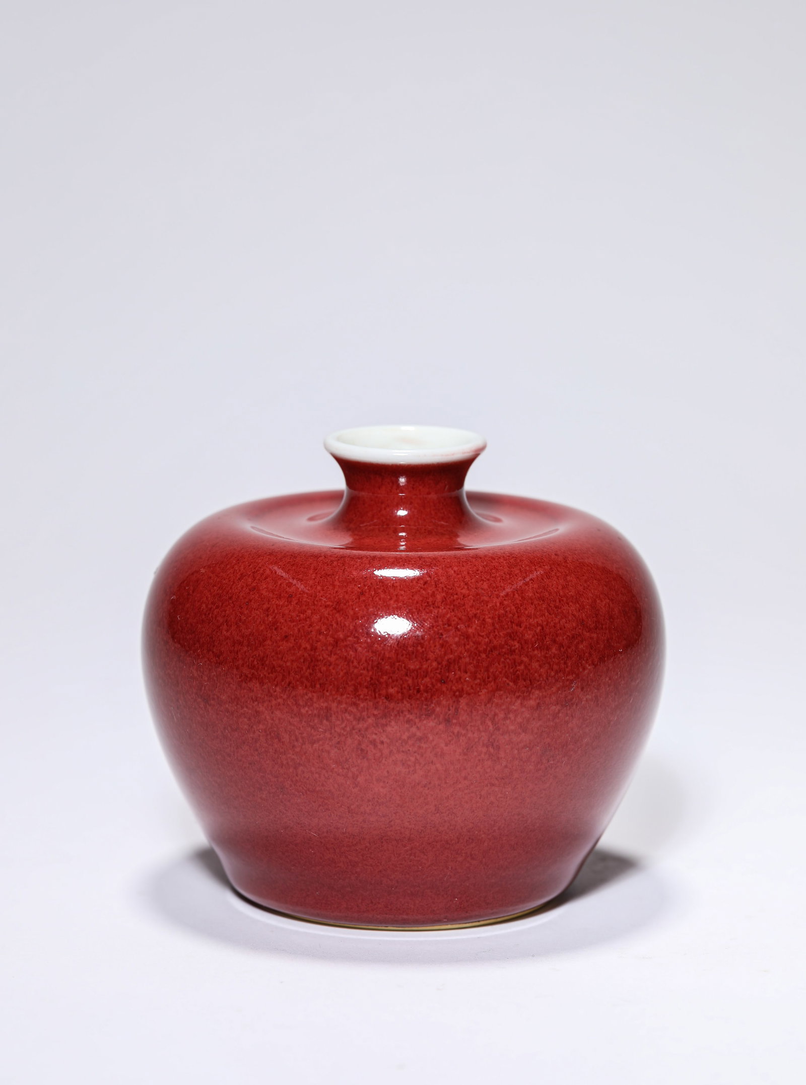 A Langyao Red-Glazed ‘Apple-Form’ Zun: A Langyao Red-Glazed ‘Apple-Form’ Zun Dimensions: Width: 9.1 cm x Height: 8 cm. All measurements are approximate.