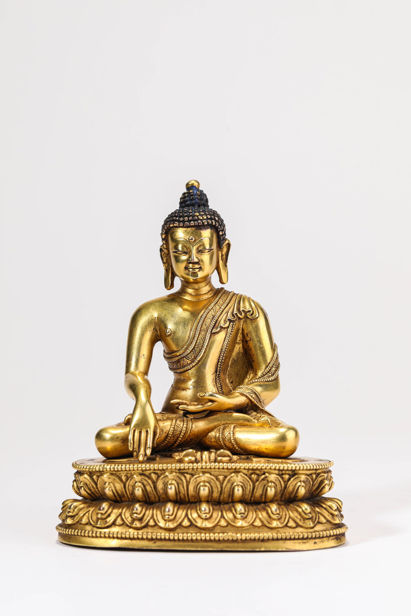 A Gilt-Bronze Figure of Shakyamuni (1 of 6)
