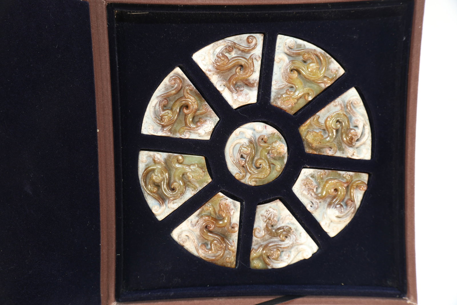Group of Nine Jade Carved Chi Dragon Bi: Group of Nine Jade Carved Chi Dragon Bi (20 x 5.7 x 6.5 x 1.3cm)