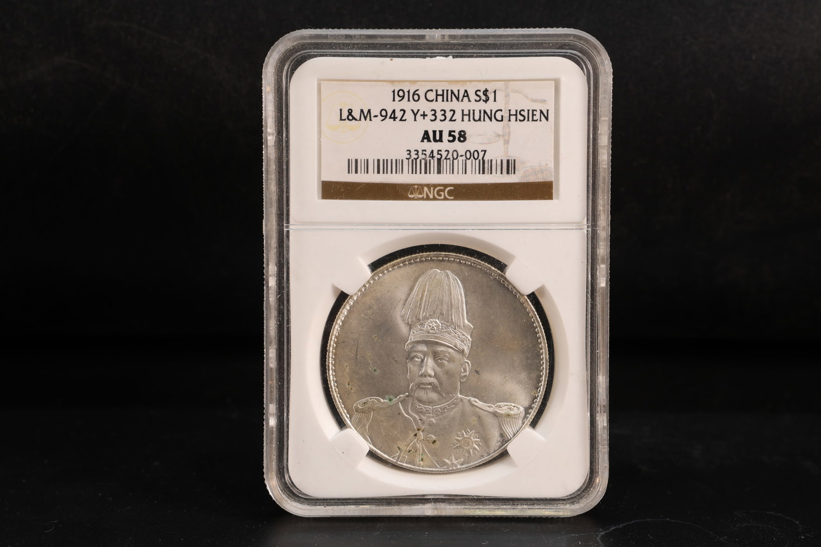 Chinese Silver Coin: Chinese Silver Coin (8.3 x 6 x 1cm)