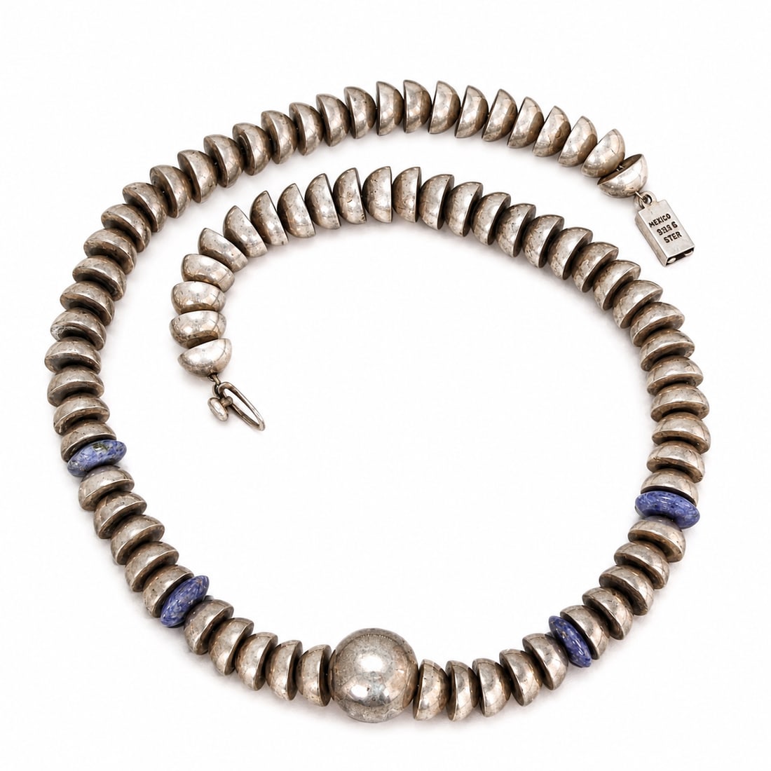 Mexican Sterling Silver Bead Heavy Necklace With Lapis Accents: Mexican Sterling Silver Bead Heavy Necklace With Lapis Accents (Total length: 54 cm, bead:1.2 x 1 cm each, Weight: 145.1 grams) Vintage Mexican sterling silver necklace featuring hand-hammered graduat