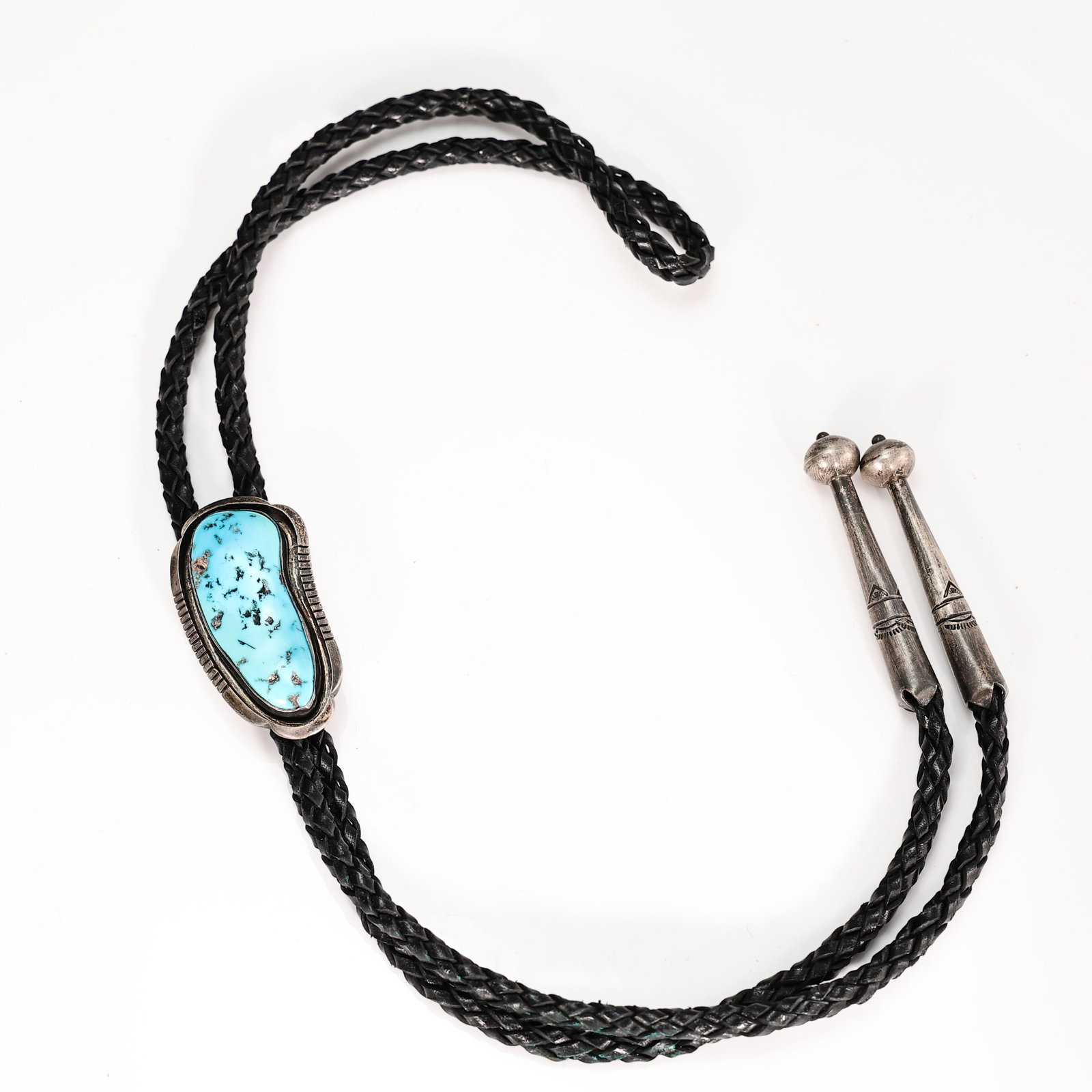 Navajo Sterling Silver Turquoise Bolo Tie 1960s By Annabelle Peterson: Navajo Sterling Silver Turquoise Bolo Tie 1960s By Annabelle Peterson (Center stone: 5 x 3 x 1 cm, Total length: 92 cm, Weight: 45.6 grams)