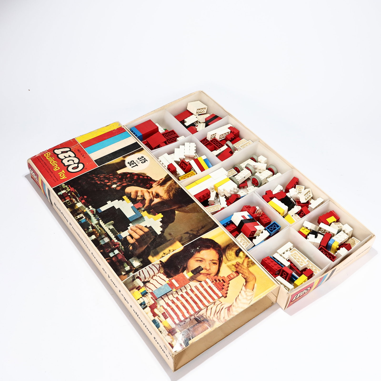 Vintage Lego Building Toy 375 Pieces Set Number 375 Retired: Vintage Lego Building Toy 375 Pieces Set Number 375 Retired (Box: 50 x 22 x 5 cm) Packaging: Original LEGO Building Toy box no. 375 with color stripe graphics and photoillustrations of children buildi