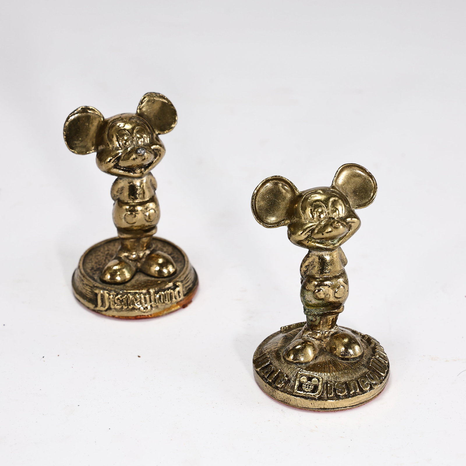 Vintage Mickey Mouse Paper Weights Set Of 2: Vintage Mickey Mouse Paper Weights Set Of 2 (7 x 4 cm each) These vintage Disneyland/Walt Disney World Mickey Mouse 1970s brass paperweight figures stand at 2.5 inches tall, featuring the iconic chara