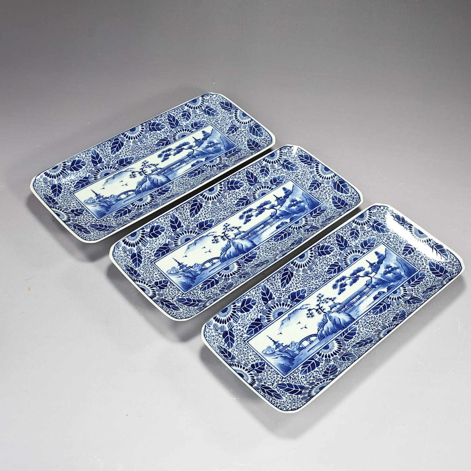 Three Japanese Imari Ware Rectangular Blue And White Plates: Three Japanese Imari Ware Rectangular Blue And White Plates (27 x 12 x 2.5 cm each)