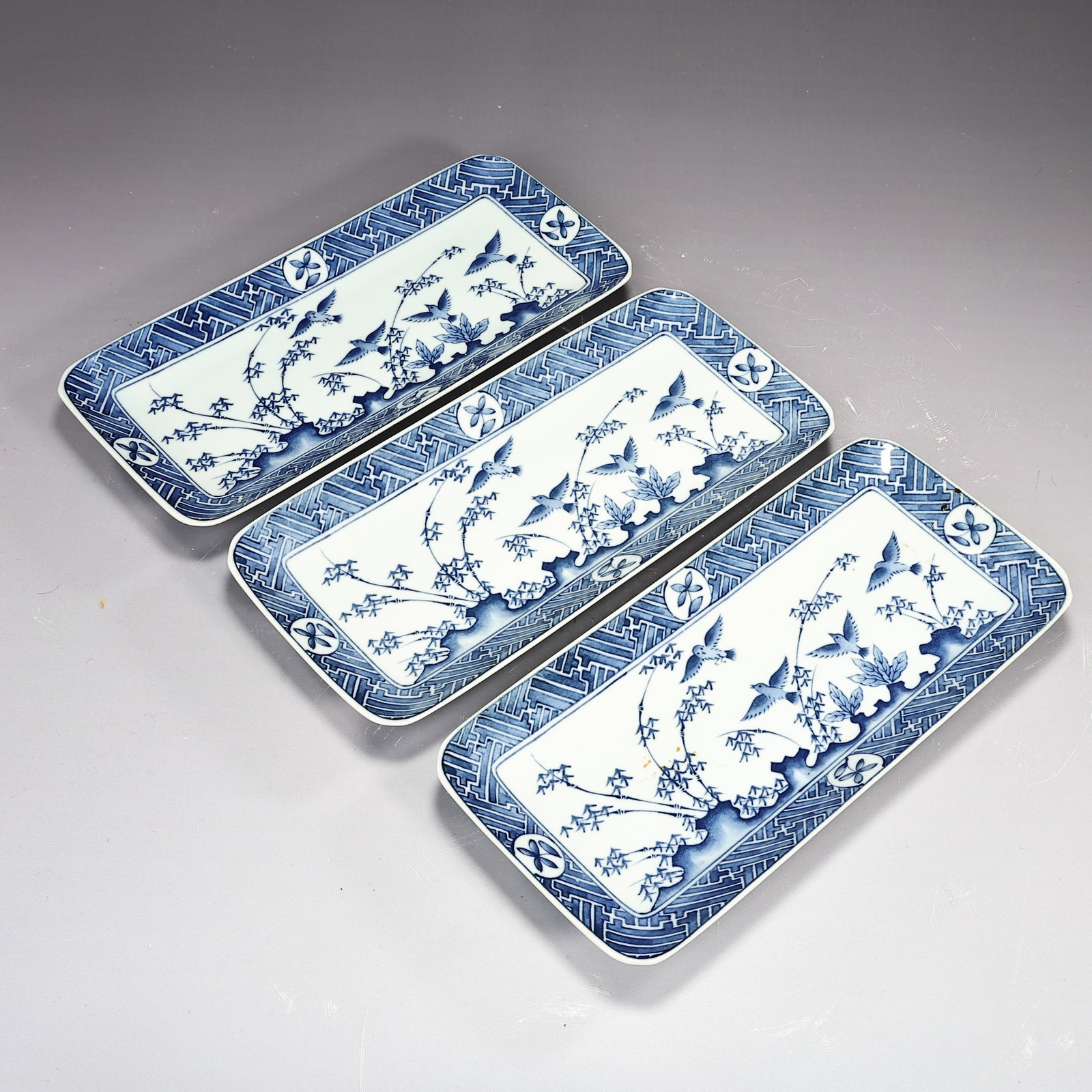 Three Japanese Imari Ware Rectangular Blue And White Plates: Three Japanese Imari Ware Rectangular Blue And White Plates (27 x 12 x 2.5 cm each)