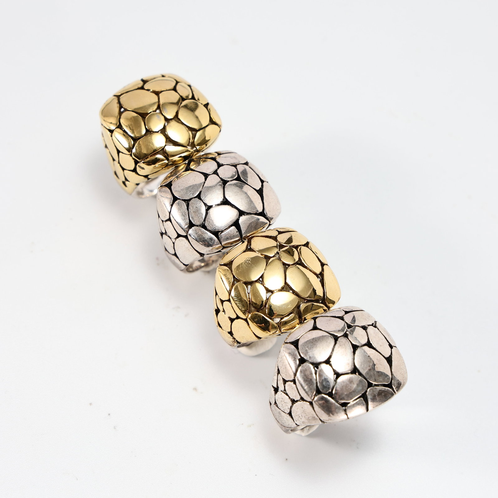 4 Sterling Silver 925 Organic Pebble Dome Cocktail Rings: 4 Sterling Silver 925 Organic Pebble Dome Cocktail Rings (Size: 5.5, 6, 5.5, 8, Weight: 49.6 grams) Lot of four sterling silver (925) statement rings featuring sculptural dome tops with an organic peb