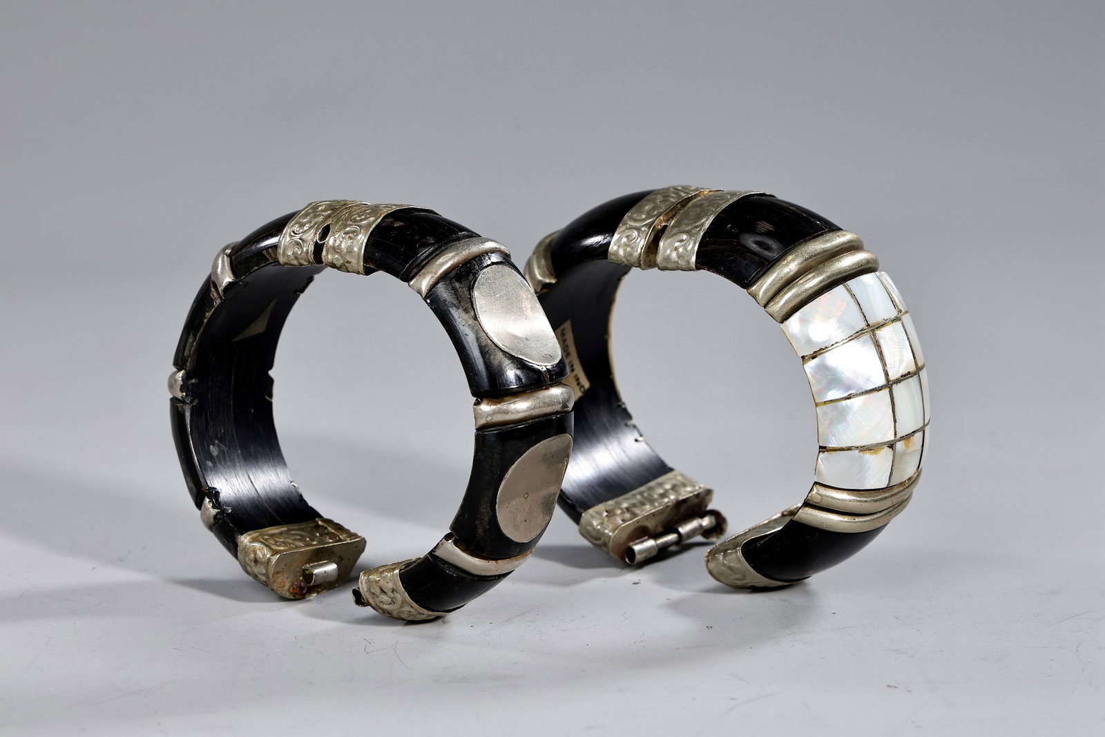 Two Hinged Bracelets Of Bone And Mother Of Pearl Silver Inserts: Two Hinged Bracelets Of Bone And Mother Of Pearl Silver Inserts (8 x 3.2 cm more or less)