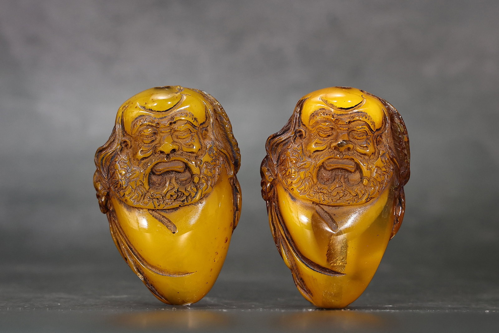 Pair Of Amber Carved Longevity God Figurines (1 of 6)